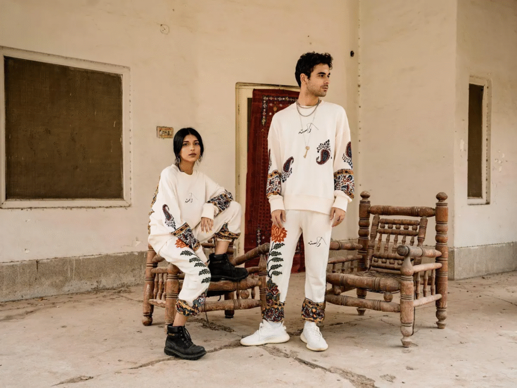 Young Pakistani wearing oversized shirt with bold patterns