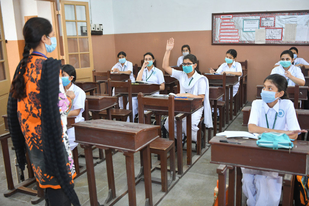 Pakistani students studying in classroom
